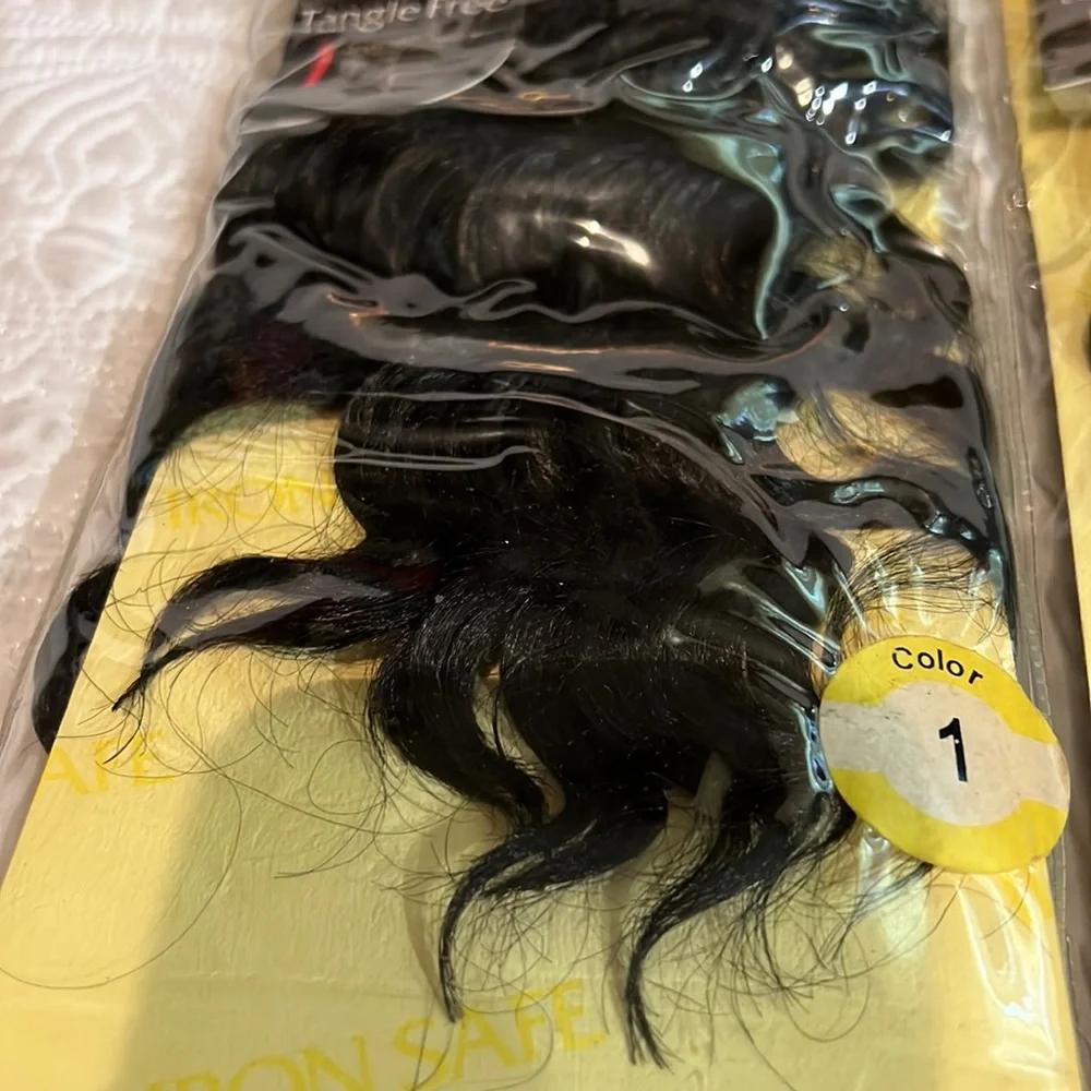 Supreme quality iron safe human hair, 2 packs, new in package‎